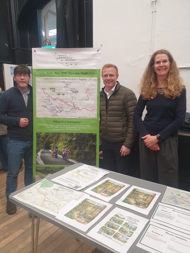 Friends of Wharfedale Greenway stall with volunteers and Robbie Moor MP